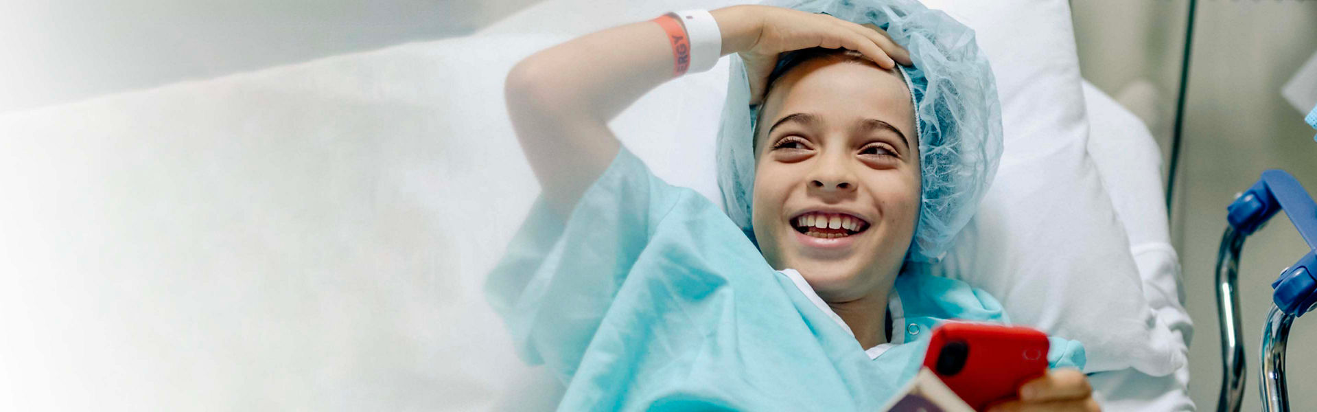 Young child lying on a hospital bed