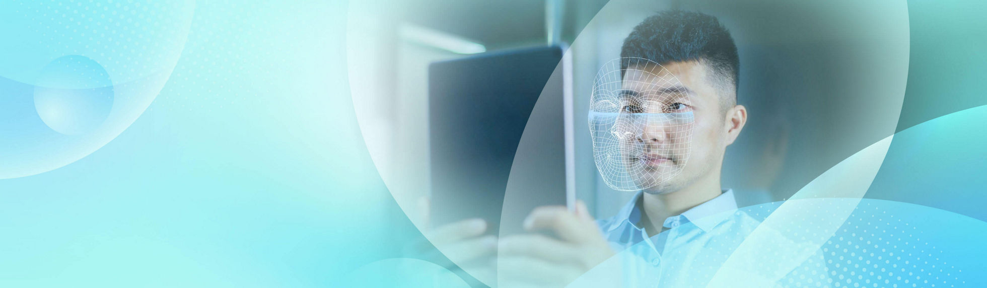 A man using AI for facial scanning on a tablet