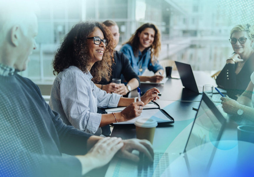 Business professionals in a meeting around a table
