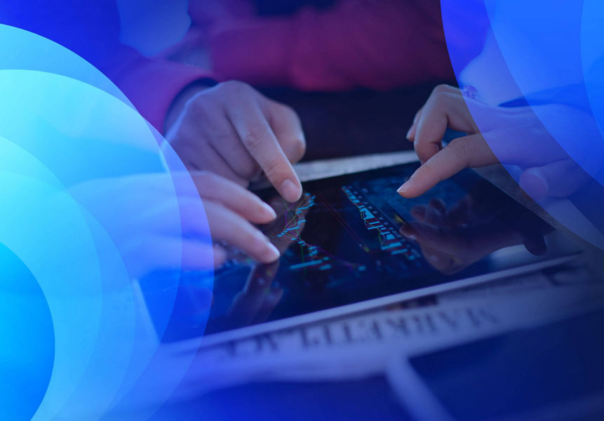 Three people interacting with graphs on a tablet