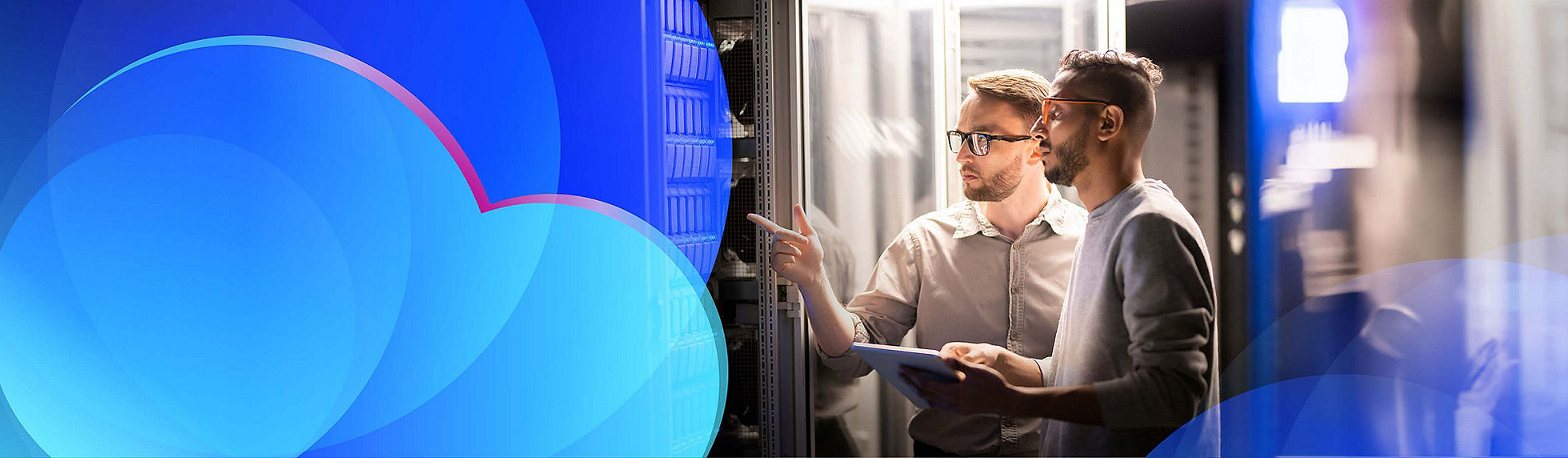 Two employees looking at a cloud server
