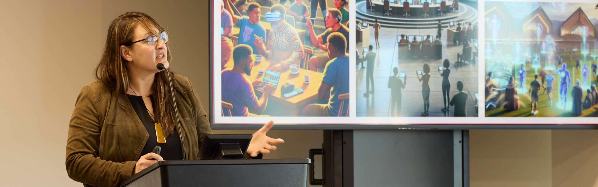 Lady at a lectern standing in front of her slideshow presentation