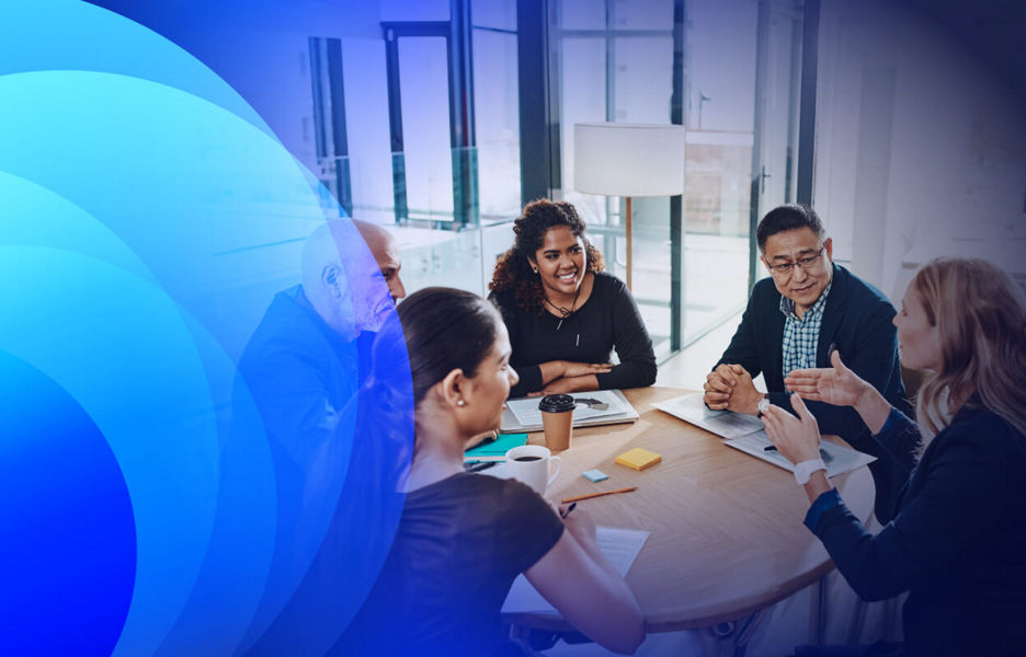 Group of people discussing at a table