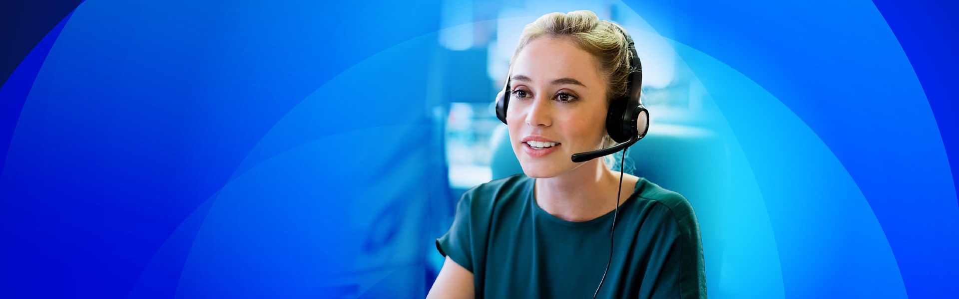 Woman using a Cisco monitor for working