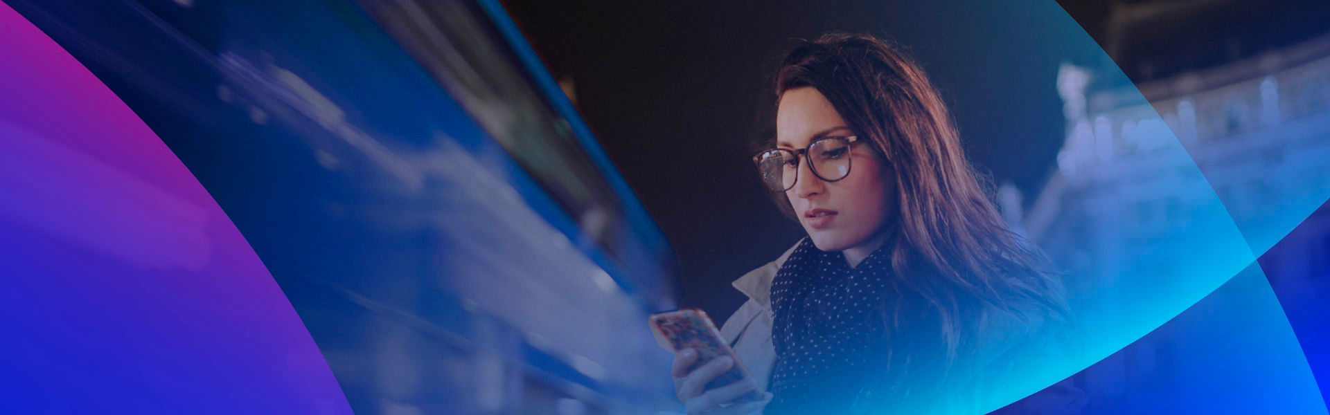 CX Whitepaper 2026 imagery of women looking at phone at night in an Urban city environment