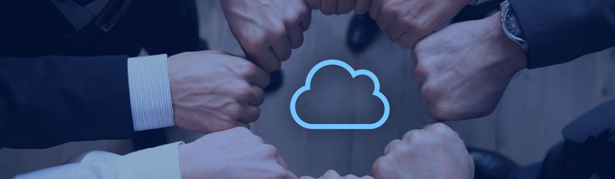 A cloud icon surrounded by the hands of business people 