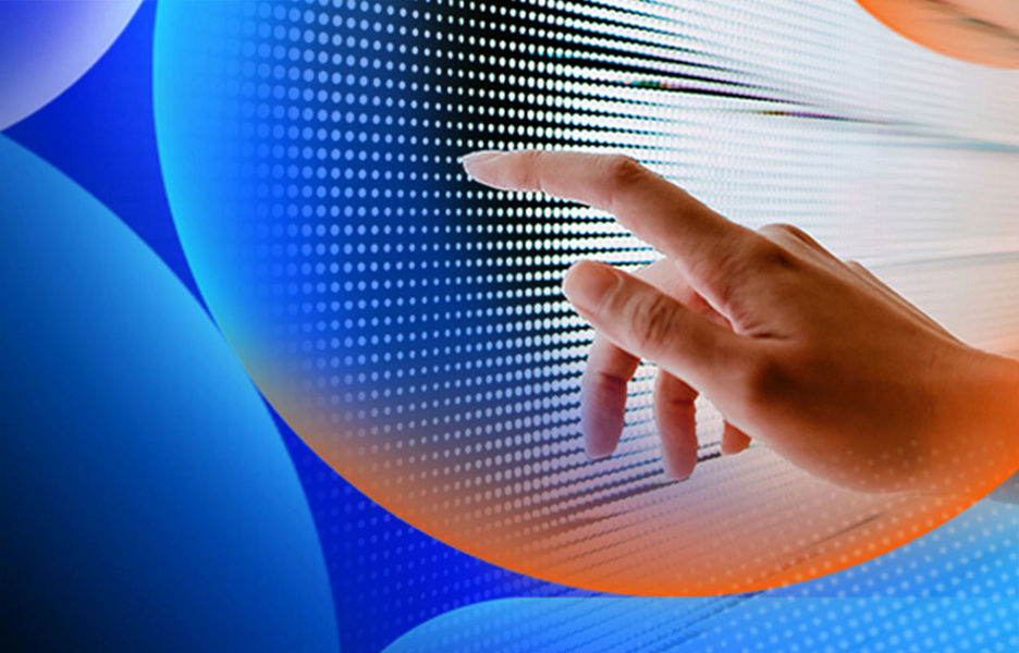A persons hand touched a screen with a black and white pattern on it with an orange and blue lens overlay