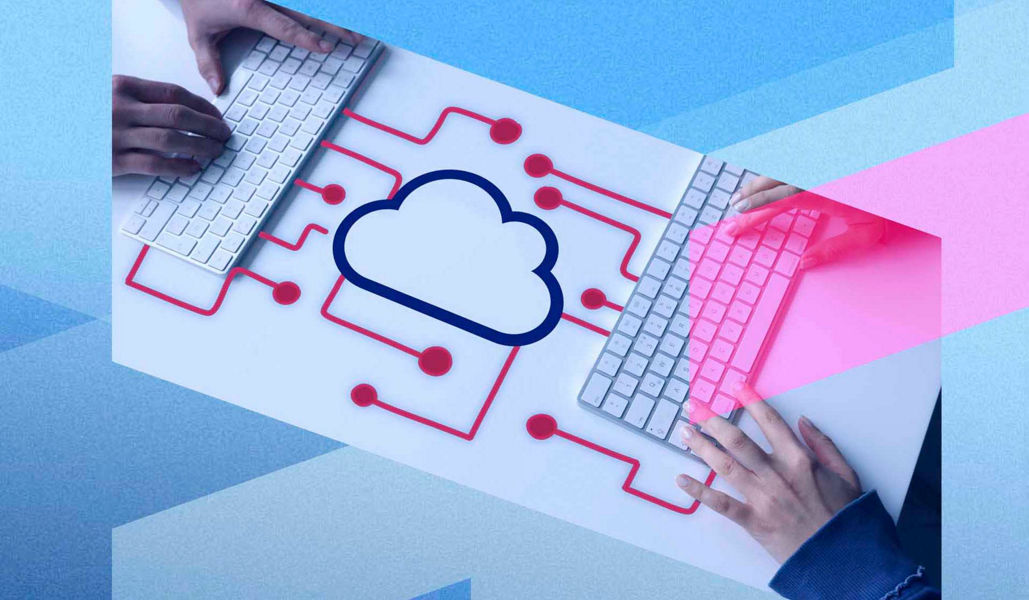 Two people using keyboards connected via cloud networking surrounded by angular geometric shapes