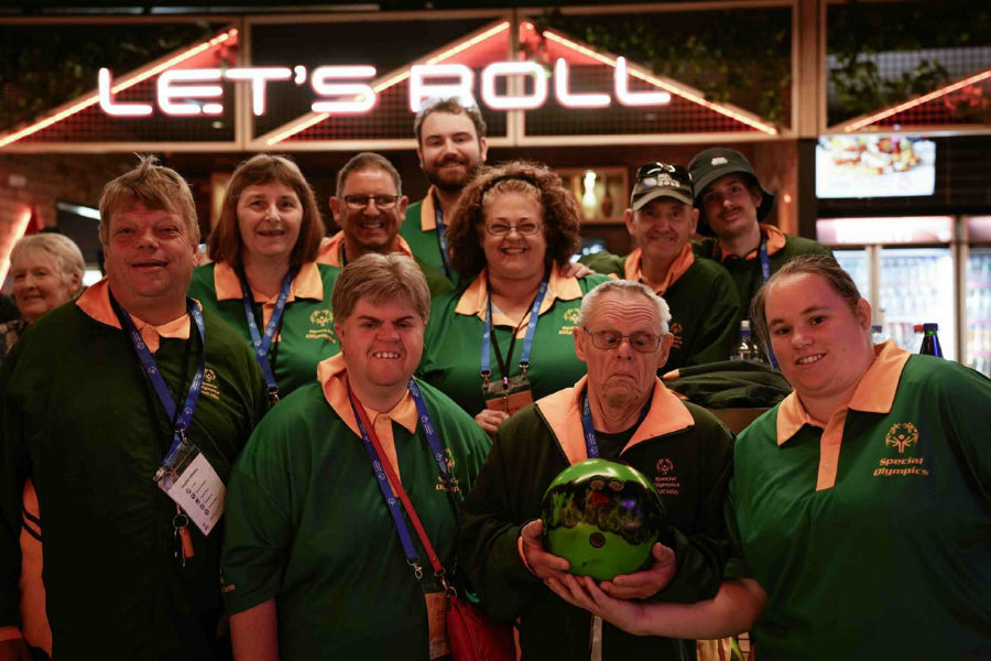Photo of Bailey with his Hutt Valley team on the tenpin bowling lanes.