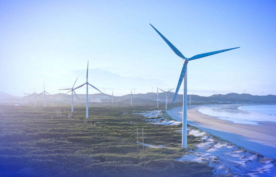 Wind turbines alongside the ocean s