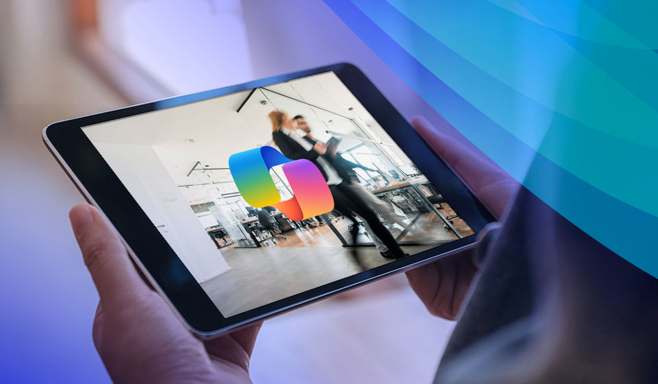 a tablet with the copilot logo being held in someones hands