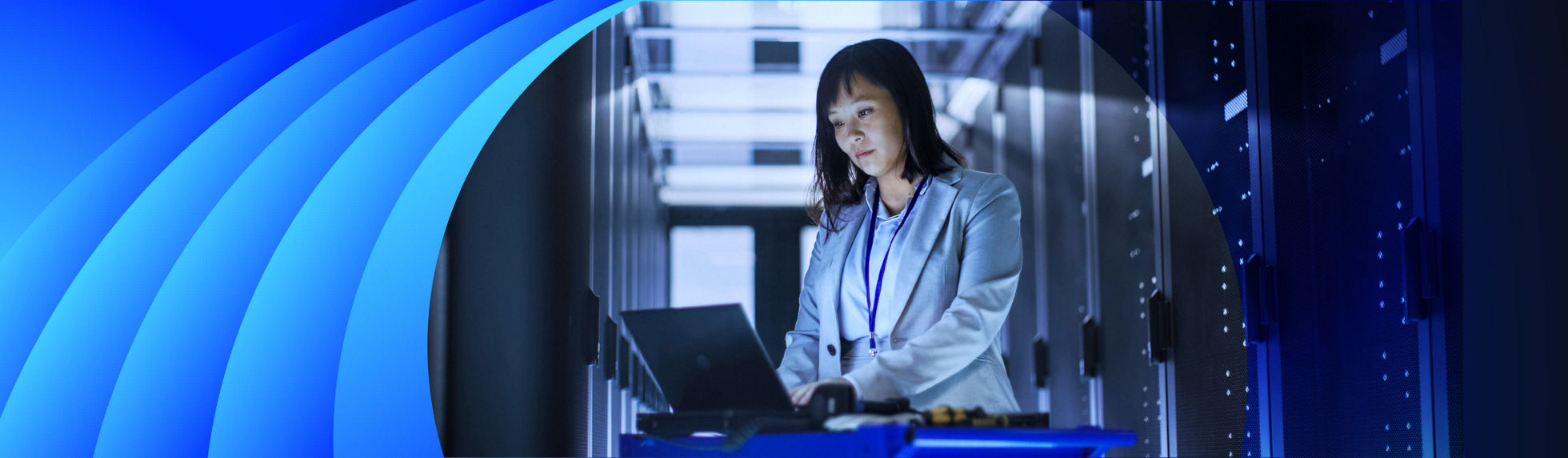 Young business woman running tests in a data centre