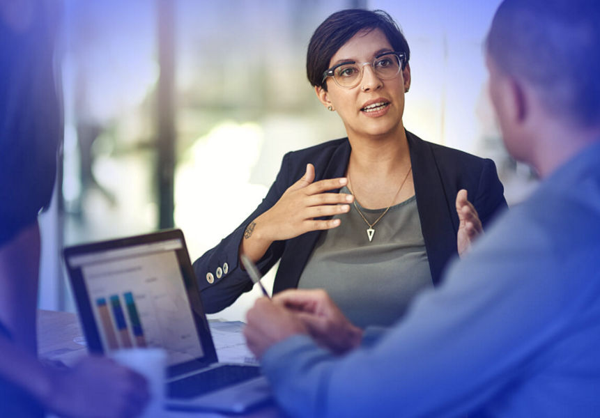 A professional presenting data and metircs to a team