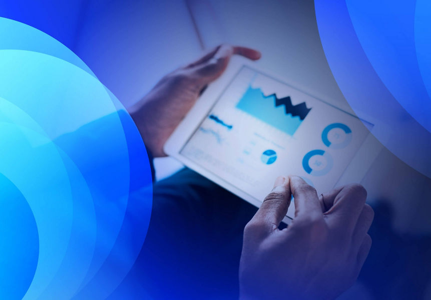 A person creating analytics dashboards for a tablet device