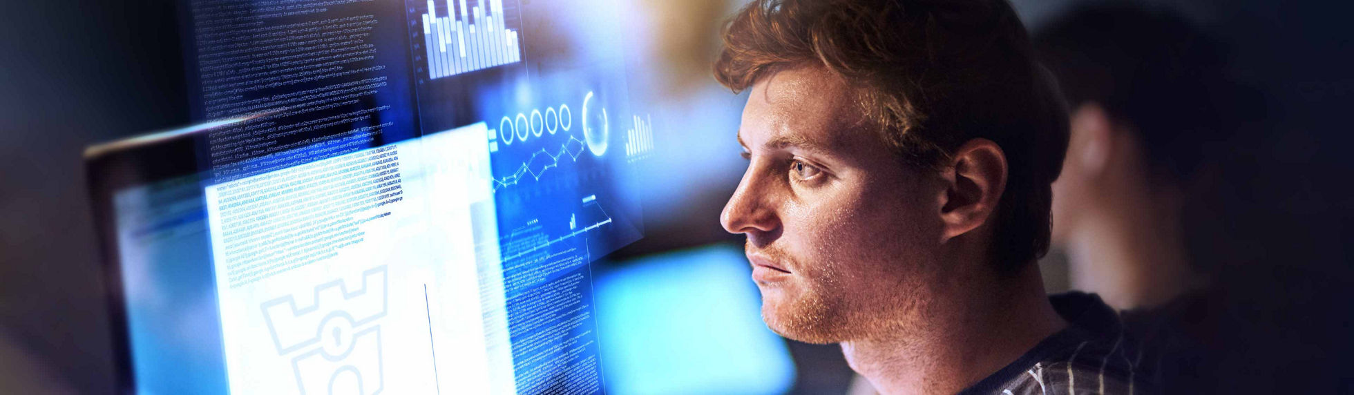 Datacom security specialist reviewing analytics