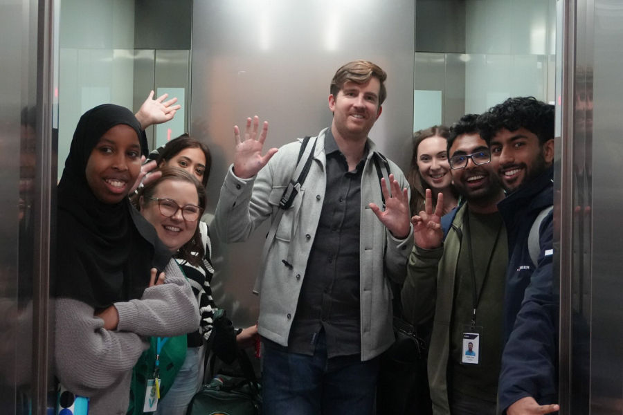 Talent Elevator 2025 attendees smiling for a photo
