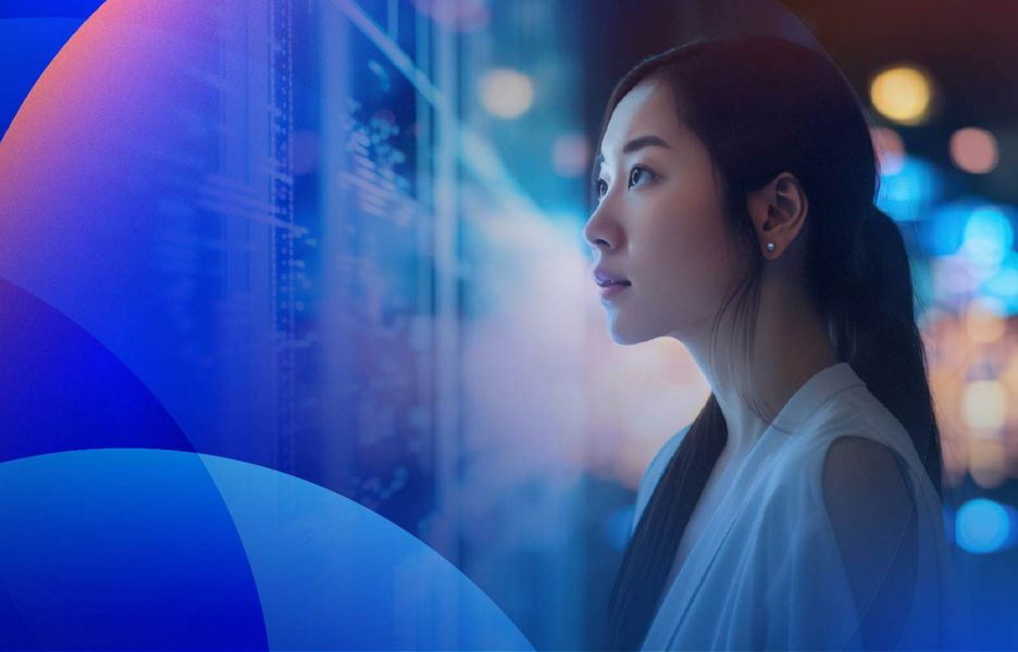 A woman looking into a window of light and technology 
