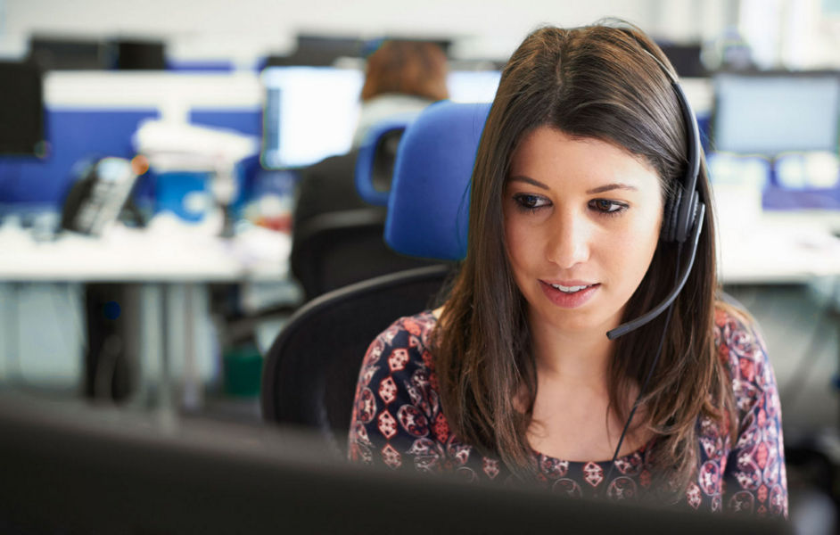 Young woman answering a customer service call