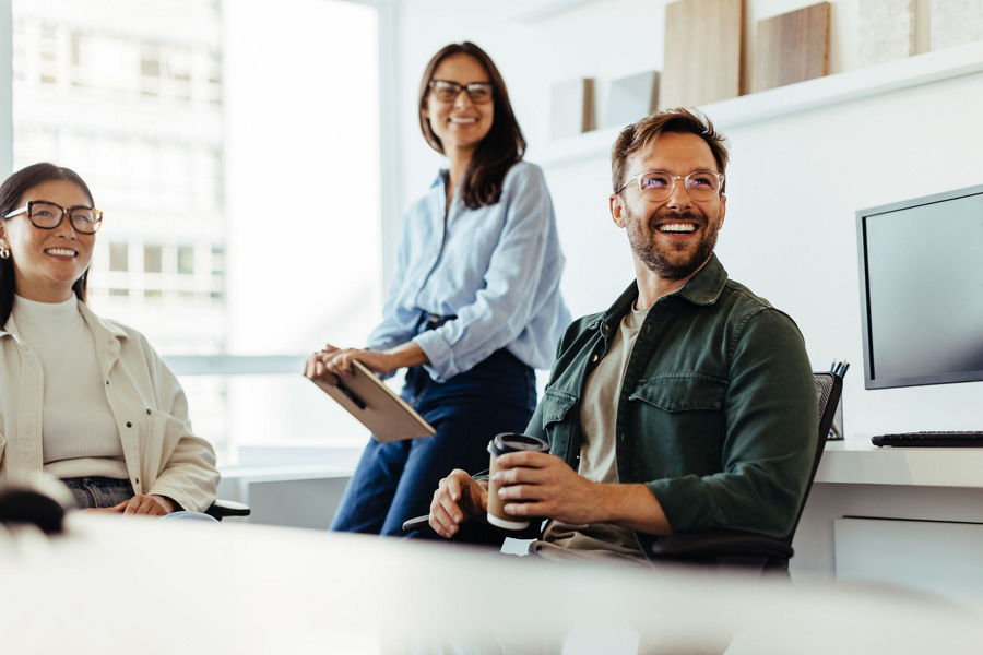 Office workers smiling