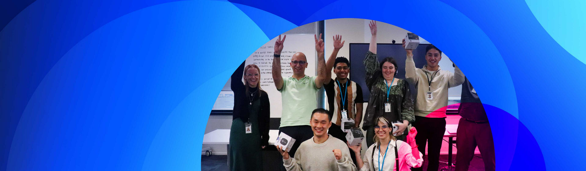 A group of excited Datacom employees and grads