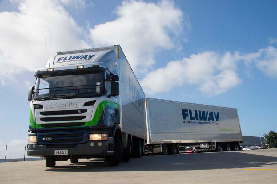 A Fliway truck with two trailers attached
