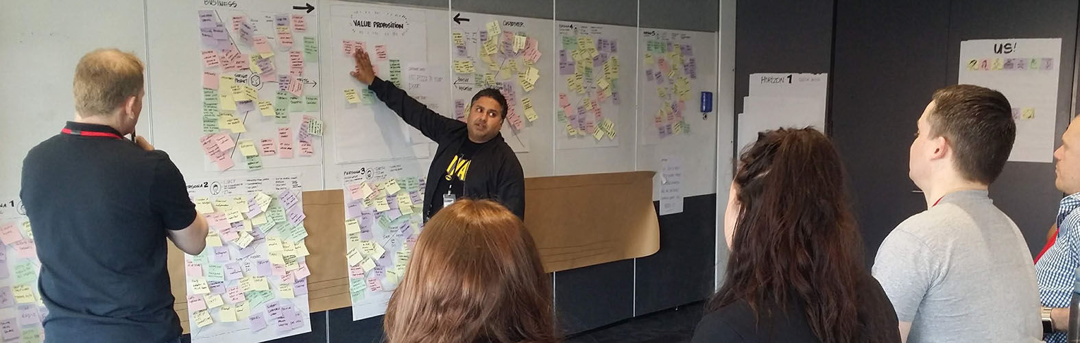 A person speaks to a group and presents a value proposition