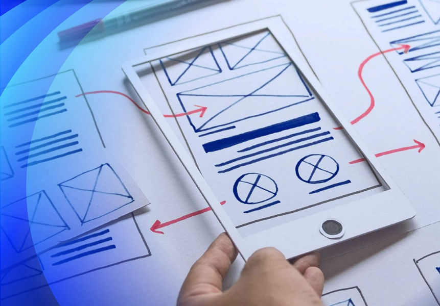 Mobile wireframes and prototypes being drawn