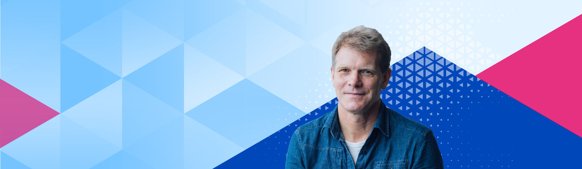 Datacom Group CEO Greg Davidson surrounded by a Datacom diamond shapes