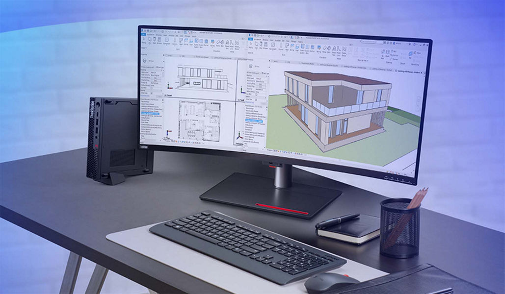 Large, curved Lenovo screen on desk displaying architectural plans of a property