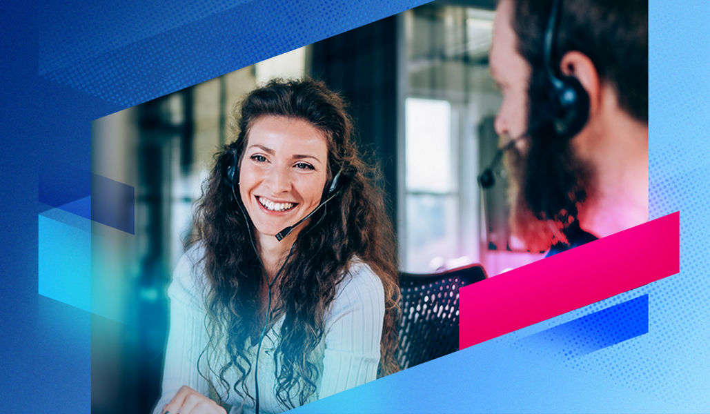 Smiling female customer service representative wearing a headset