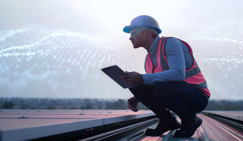 An engineer sitting down, surveying the landscape