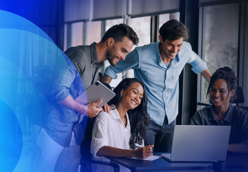 Infrastructure products pre-sales team collaborating around a laptop.