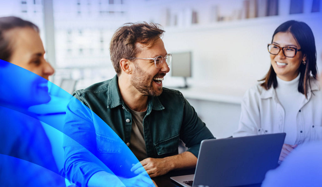 Professionals having a roundtable team meeting in an office with lens pattern overlay