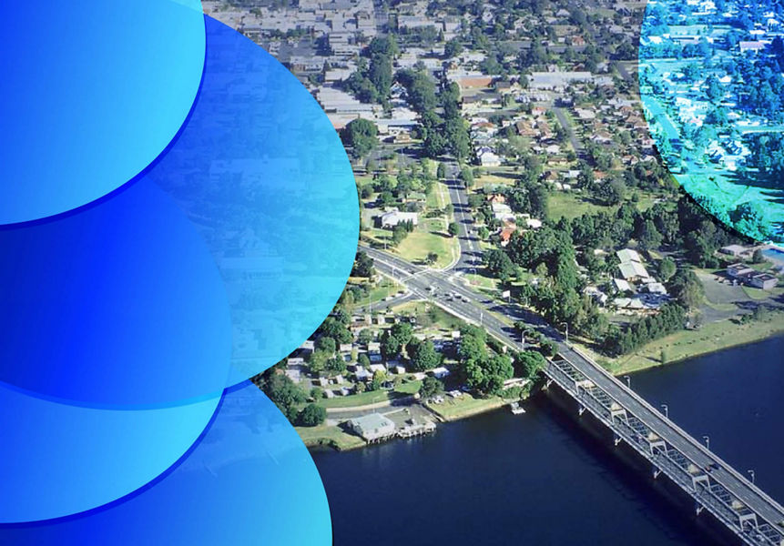 An aerial shot of a local Australian bridge and community