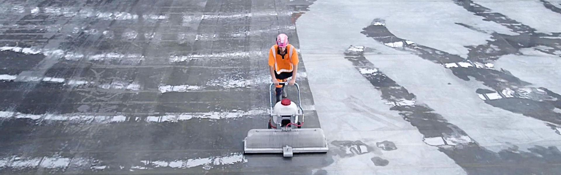 man laying cement