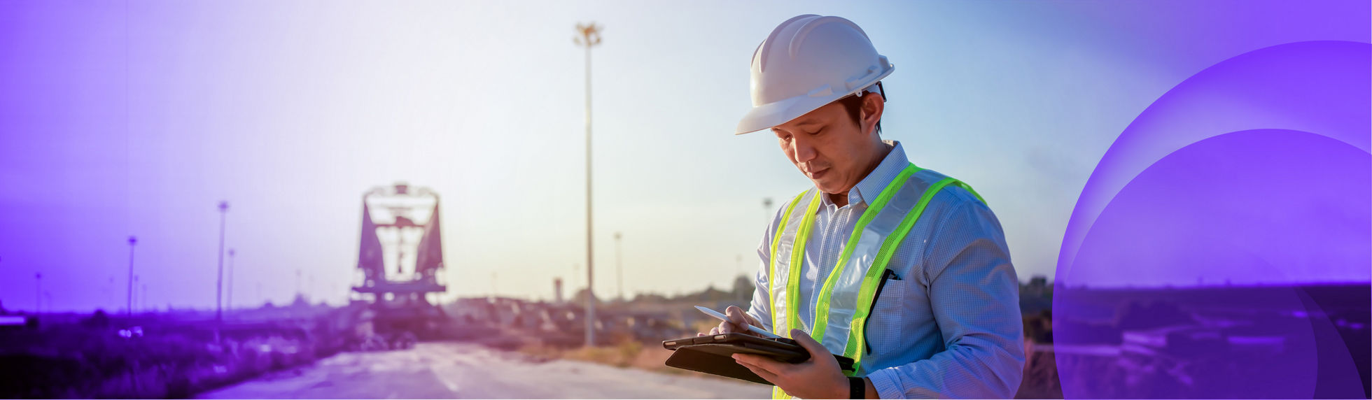 A person wearing a hard hat running some fieldwork tests