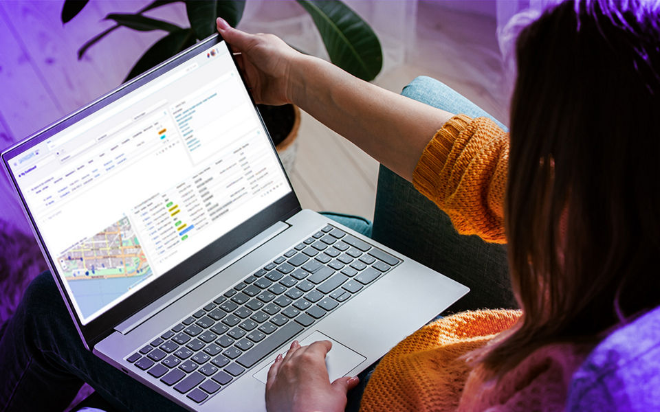 A person using the Datascape portal on a laptop