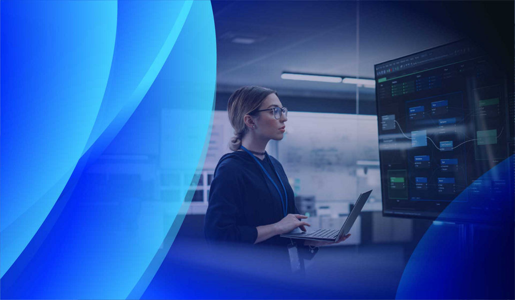 A woman installing and setting up IT software in an office