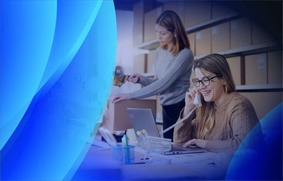 A woman procuring items online for her business while talking on the phone