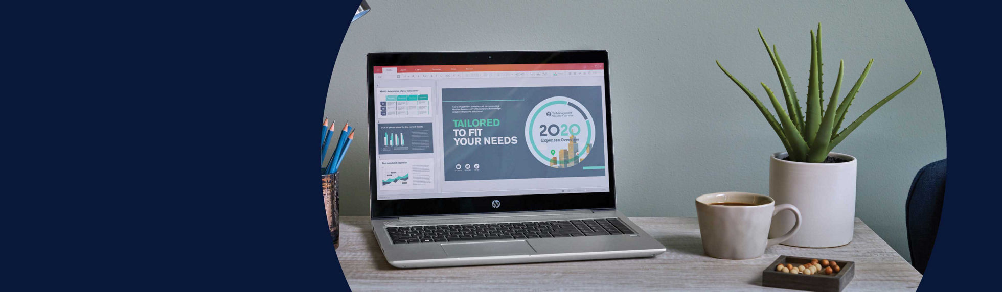 An HP laptop sitting on a desk next to a plant