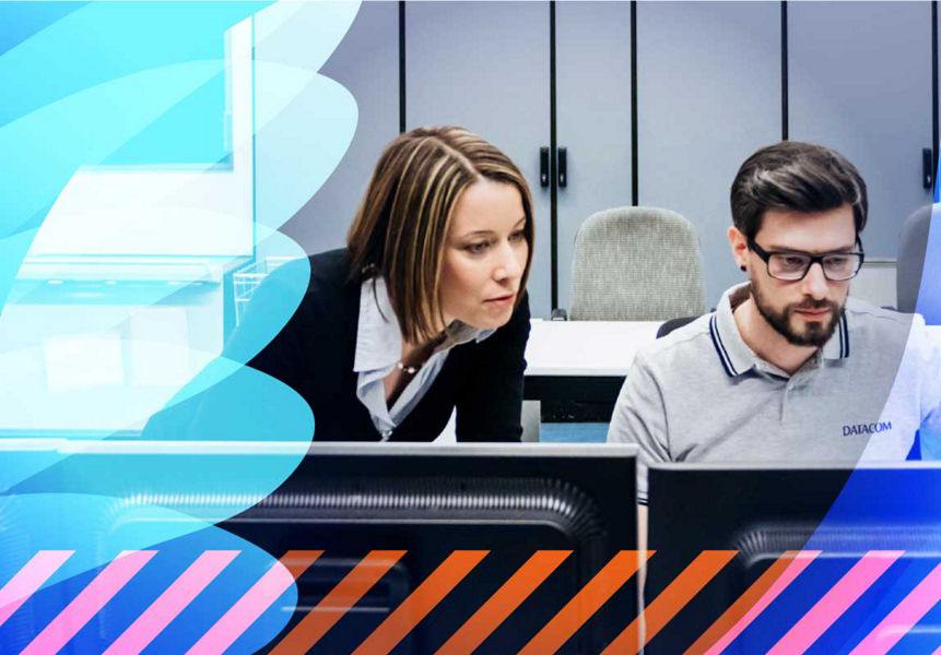 Two security specialists monitoring a screen