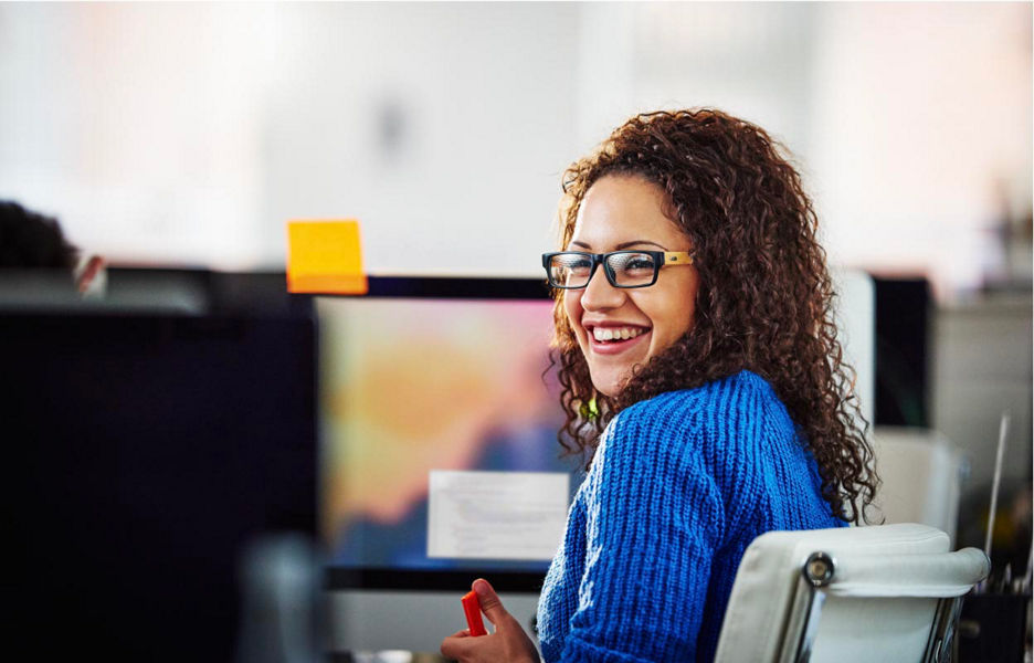 Lady smiling in an office