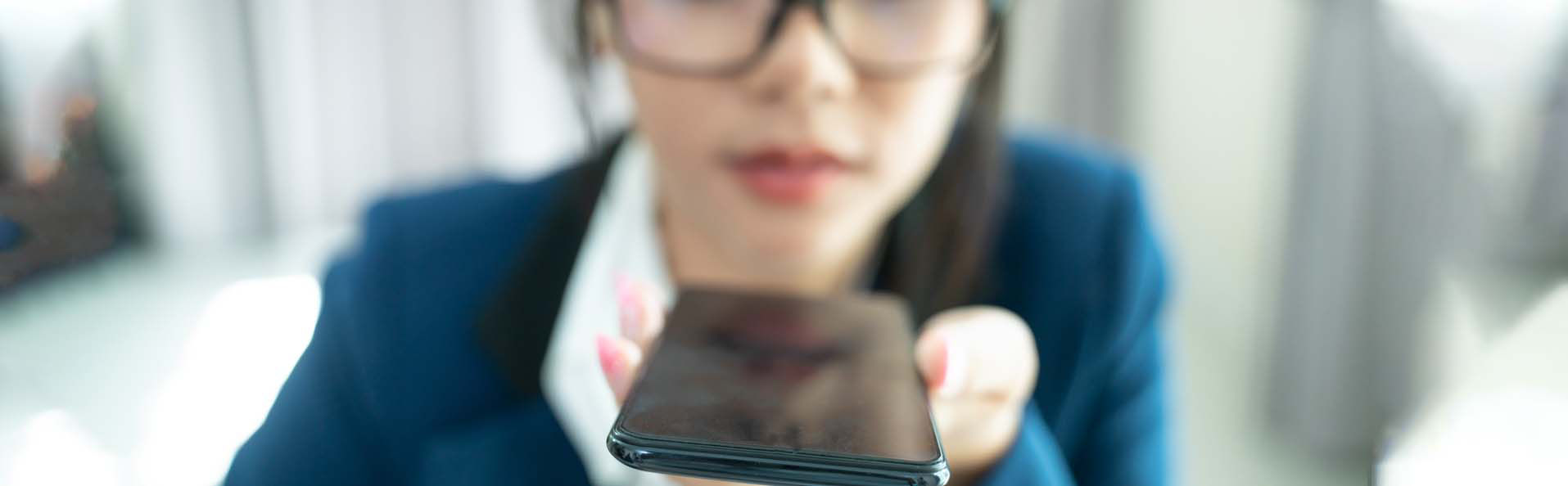 a lady holding her mobile