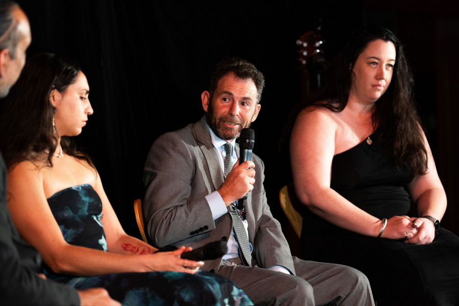 Photo of Todd Rose, End User Support Customer Lead, talking on stage.