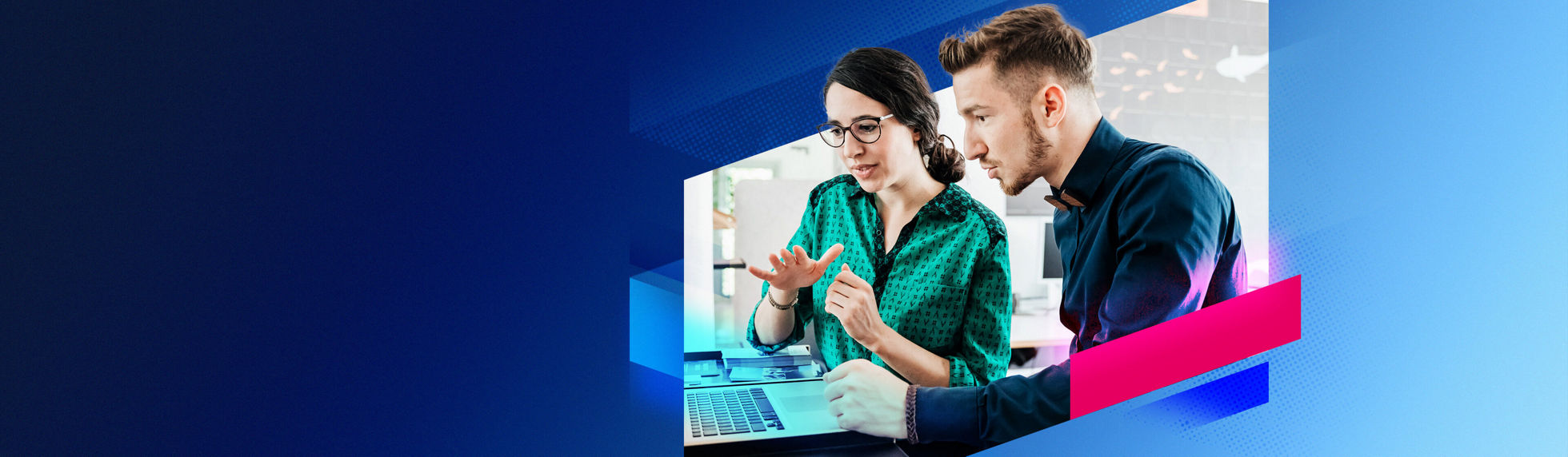 Man and woman looking at laptop