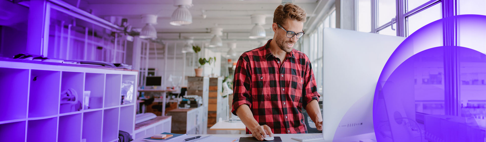 A man building websites in an office
