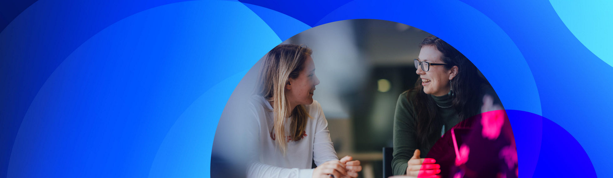 People at Datacom chatting in our Auckland office