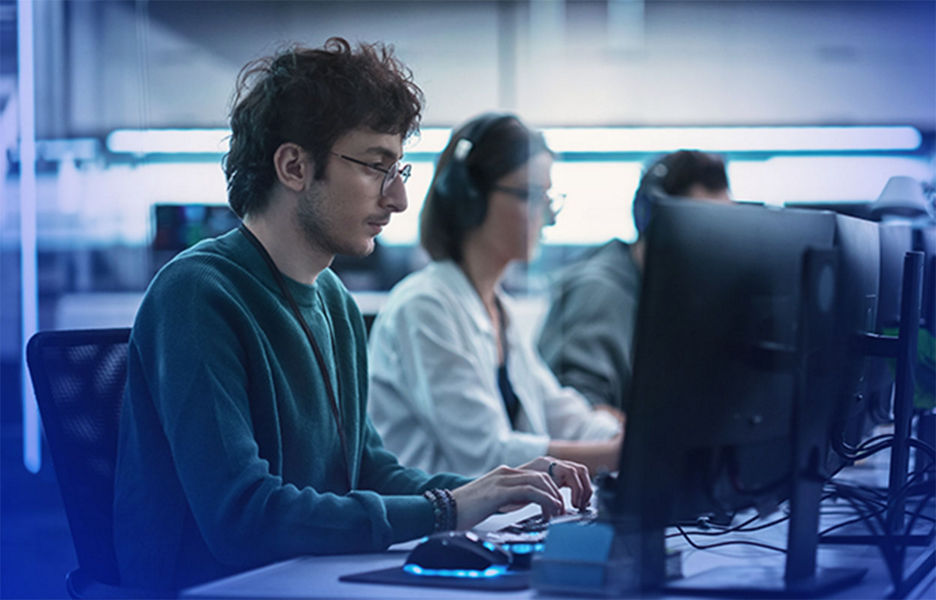 Working at computers in a tech-focused office