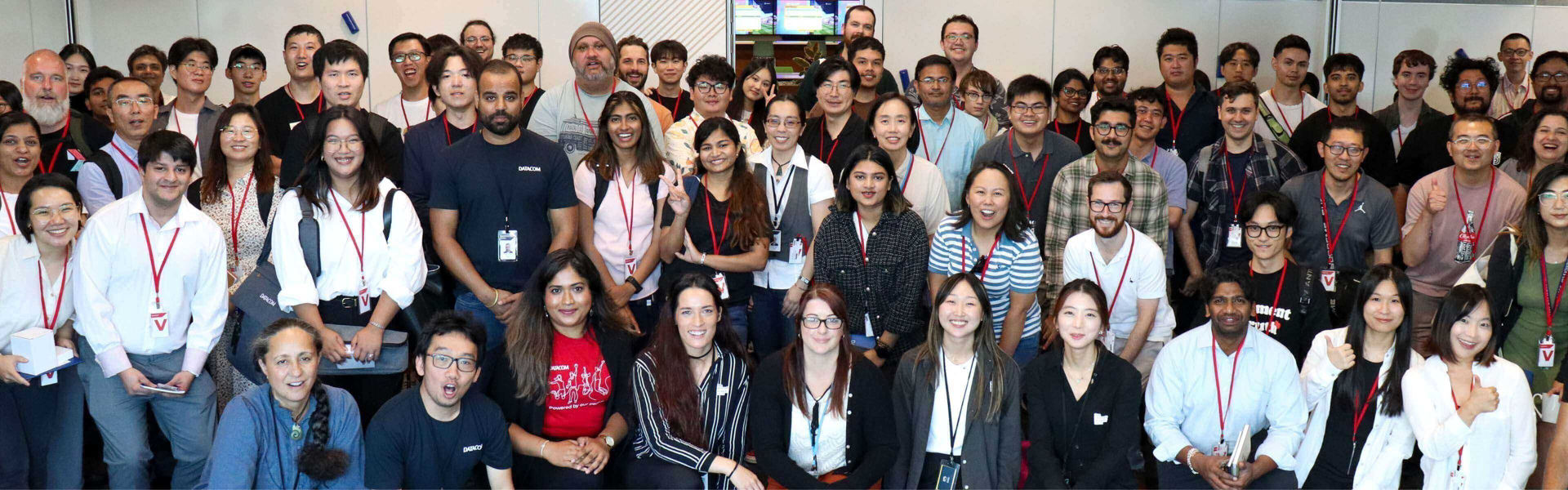 Group of employees smiling at camera