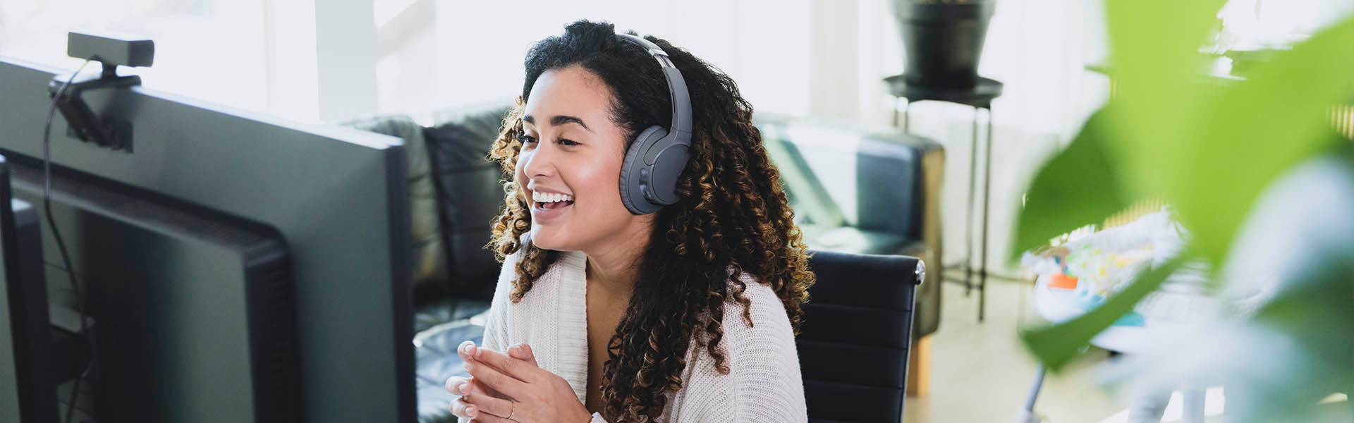 A customer service representative on a call while working from home